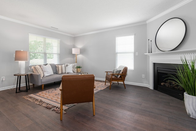 living room with a fire place, two brown leather chairs and a grey couch